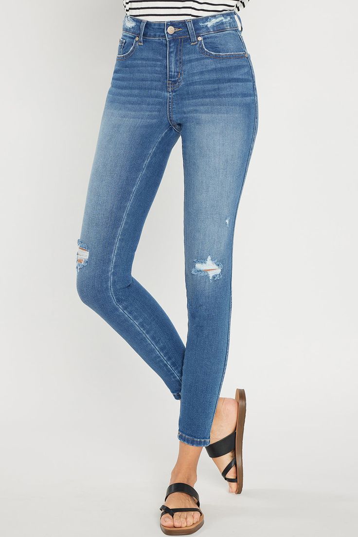 STYLE: WEP3516 | COLOR: MEDIUM Destructed Waist Band High Rise Ankle SkinnyHigh rise ankle skinny jeans with destructed waist band and knee destruction.Hand Sanding, Grinding and Whiskers, One button closure, Zip Fly, Regular hem. INSEAM: 27” FRONT RISE: 9 1/2” CONTENT: 90% COTTON / 8% ZT800 (PREMIUM POLYESTER) / 2% LYCRA Model in size 3. Model size: HEIGHT: 5' 9" BUST: 34" WAIST: 25" HIP: 35" Care Instructions Color may transfer when new. Wash once separately in cold water before wearing. Machi Waist Band, Casual Style, Cold Water, Care Instructions, Night Out, High Rise, Buy Now, Band, High Quality