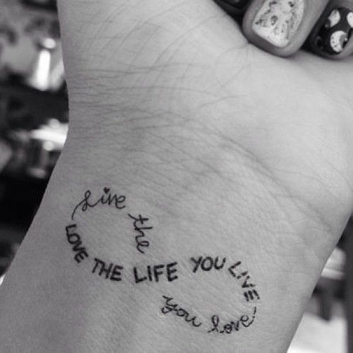 a woman's hand with a tattoo on it that says, you are the life you