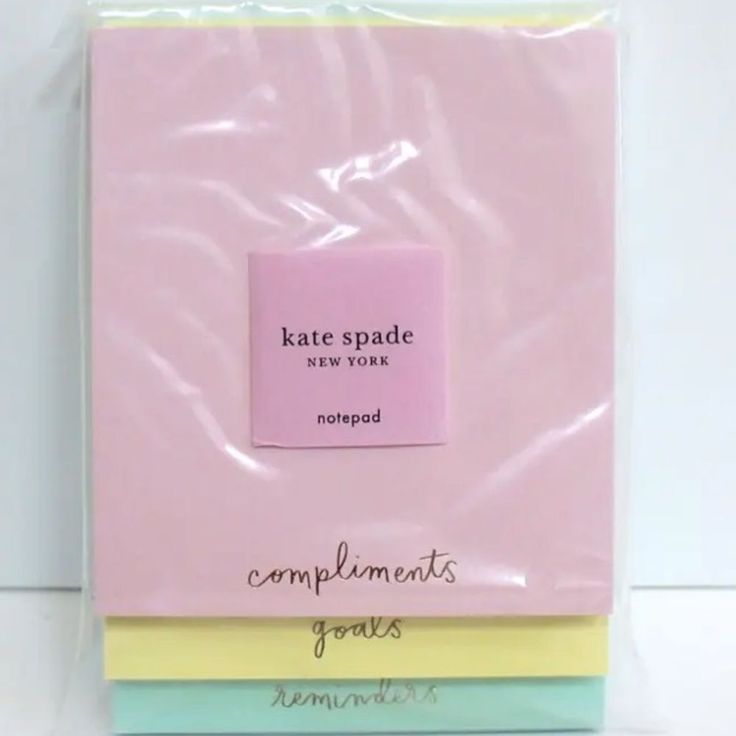 three pink and yellow sheets with the words kate spade next to each other on them