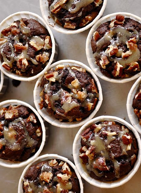 chocolate cupcakes with pecans and nuts in them