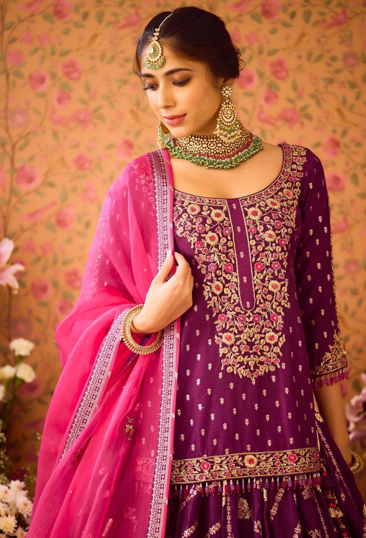 Step into refined elegance with the phlox purple hand-embroidered silk brocade kurta, beautifully paired with a multi-panel brocade lehenga. This stunning ensemble features intricate embroidery that elevates the luxurious fabric, while the lehenga offers graceful movement and flair. Complemented by an embroidered dupatta, this outfit is perfect for festive occasions and celebrations, showcasing a harmonious blend of tradition and style. Brocade Kurta, Brocade Lehenga, Kurta Lehenga, Pink Kurta, Graceful Movement, Purple Hands, Embroidered Dupatta, Casual Tunics, Silk Brocade