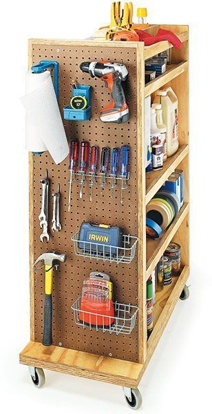 a wooden shelf with tools and other items on it