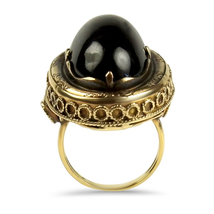 This 14K Yellow Gold Victorian Hair & Garnet Cabochon Ring is a stunning example of Victorian mourning jewelry. It features a 23x14mm garnet cabochon, weighing an estimated 36 carats, elegantly bezel set in an engraved and milgrained ring mounting. The closed back of the ring reveals framed woven hair, a traditional element of mourning pieces from the Victorian era. The ornate frame measures 31x22mm, complemented by a polished 2mm shank. This ring is size 6.5 and tested to be 14k gold. Please no Luxury Domed Cabochons For Formal Occasions, Luxury Cabochon Signet Ring For Formal Occasions, Luxury Domed Cabochon Rings, Oval Yellow Gold Cabochons For Formal Events, Classic Domed Cabochons With Polished Finish, Luxury Domed Collectible Jewelry, Luxury Collectible Domed Jewelry, Vintage Oval Cabochons For Formal Occasions, Elegant Formal Cabochon Ring