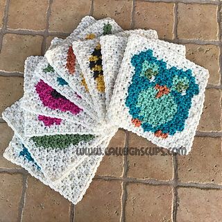 four crocheted coasters on the ground