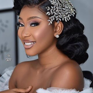 a woman wearing a bridal hair piece