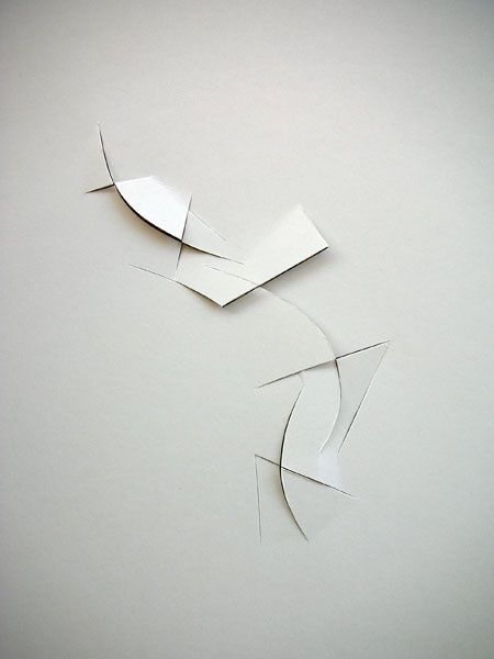 a piece of paper that has been cut into shapes