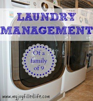 the words laundry management are in front of washer and dryer stacked on top of each other