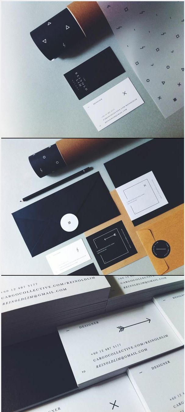 the stationery is laid out neatly on top of each other, including envelopes and business cards