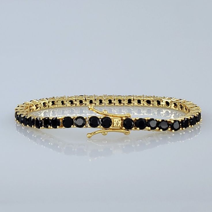 Brand New Women's Gold & Onyx Tennis Bracelet 7" - The Most Common Women's Size. Width 4mm 14k Gold Plated Sterling Silver Genuine 2ct Natural Black Onyx Gemstones Retail Price $450 Buy With Confidence From A Top Rated Seller With A 99%+ Rating! *Also Available In Silver / Black A2125 (Id-651) Classic Tennis Bracelet With Black Diamonds, Adjustable Black Tennis Bracelet As Gift, Adjustable Black Tennis Bracelet For Gift, Classic Tennis Bracelet With Black Diamonds For Formal Occasions, Formal Tennis Bracelet With Black Diamonds, Classic Black Diamond Bracelet For Anniversary, Classic Black Diamond Bracelet For Formal Occasions, Classic Black Diamond Tennis Bracelet, Aaa Quality Black Jewelry For Formal Occasions