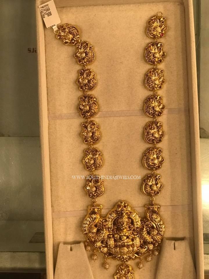 Gold Long Lakshmi Temple Haram Designs, 22K Gold Long Lakshmi Haram Designs, Gold Temple Haram Designs. Gold Mango Haram, Lakshmi Temple, Lakshmi Haram, Gold Haram Designs, Haram Designs, Gold Haram, Temple Jewelry Necklace, Indian Wedding Jewelry Sets, Long Haram