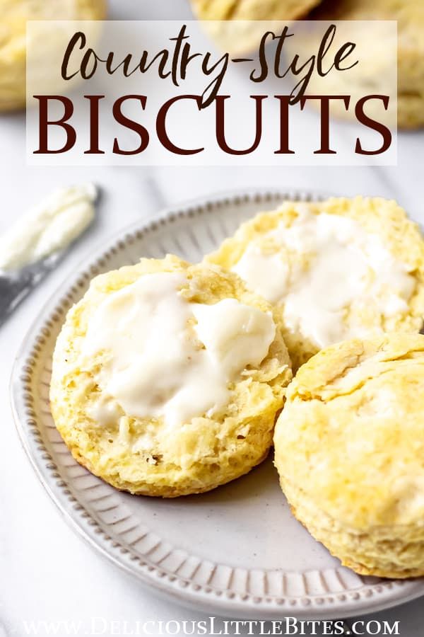 biscuits with butter and icing sitting on a plate