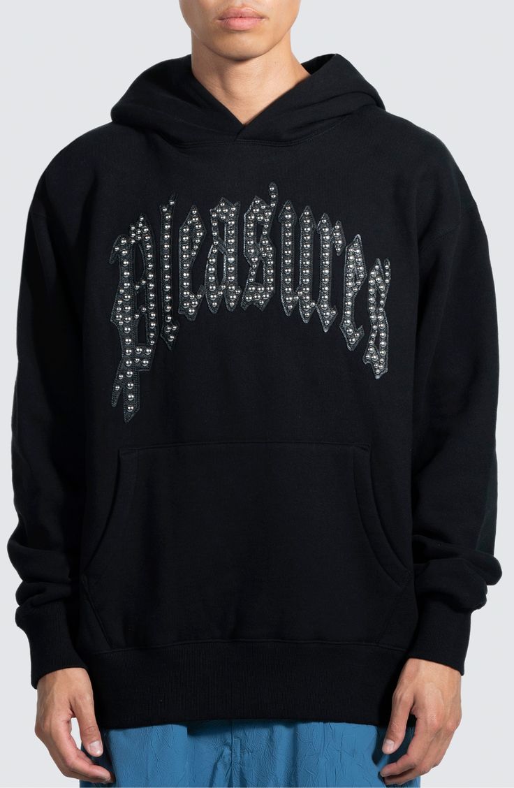 A shiny-studded logo arcs across the chest of this cozy staple hoodie, providing just the right amount of edge. Fixed hood Kangaroo pocket Ribbed cuffs and hem 57% cotton, 43% polyester Machine wash, tumble dry Imported Fall Hoodie With Rhinestones, Fall Rhinestone Hooded Hoodie, Fall Rhinestone Hoodie, Hooded Rhinestone Hoodie For Streetwear, Rhinestone Hooded Hoodie For Streetwear, Rhinestone Hoodie For Streetwear, Streetwear Hoodie With Rhinestones, Black Rhinestone Hoodie For Winter, Winter Rhinestone Hoodie For Streetwear