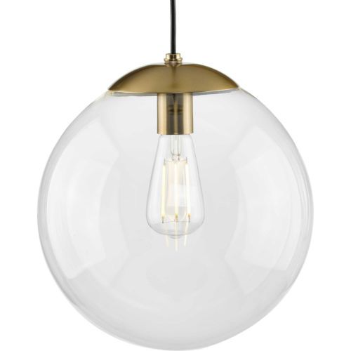 a clear glass light bulb hanging from a brass ceiling fixture with a black cord and a gold metal fitting