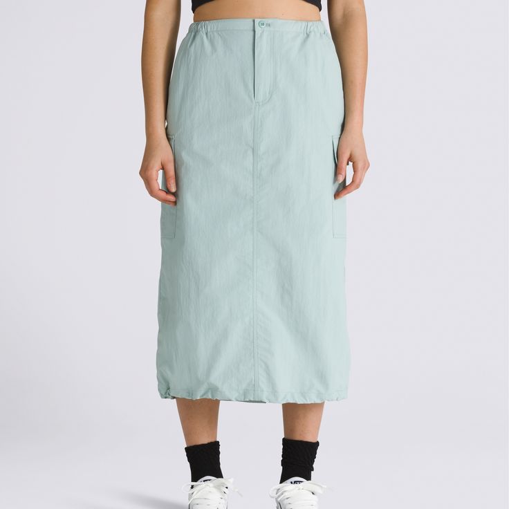 Made to move, the Riley Parachute Cargo Skirt is a roomy skirt with a fitted waist, cargo pockets with flap closures, and stylish bungee details with a drawstring hem. 100% Nylon fabric Cargo pocket with flap closure Bungee details | Vans Riley Parachute Cargo Skirt Womens XS Utility Cargo Skirt With Elastic Waistband, Utility Skirt With Elastic Waistband, Spring Nylon Cargo Skirt With Pockets, Casual Cargo Pocket Skirt, Loose Fit Nylon Casual Skirt, Casual Nylon Skirt With Relaxed Fit, Casual Nylon Skirt With Elastic Waistband, Casual Relaxed Nylon Skirt, Relaxed Casual Skirt With Multiple Pockets