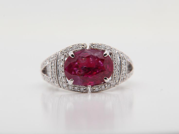 A brand new AGL (Thai) certified 3.56 burma ruby no heat purplish red and diamond ring in 18 karat gold . The ruby weigh 3.56 carat and diamond weigh 0.39 carat. The total ring weight is 4.87 grams. The ring size US 5.50 and EU 51. Luxury Oval Ruby Ring With Pave Setting, Oval Ruby Diamond Ring With Pave Setting, Red Oval Diamond Ring With Pave Setting, Formal Pink Sapphire Ring With Pave Setting, Formal Gia Certified Lab-created Ruby Ring, Vvs Clarity Ruby Ring For Formal Occasions, Ruby Ring With Vvs Clarity For Formal Occasions, Formal White Gold Ruby Ring With Pave Setting, Classic Red Diamond Ring With Pave Setting