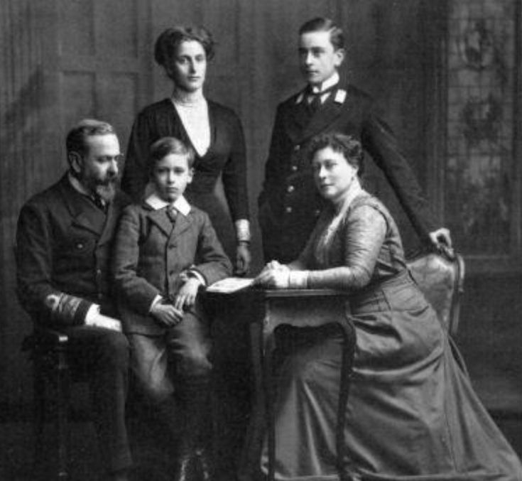 an old black and white photo of a family posing for a photograph in the early 1800s's