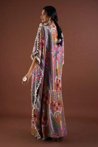 Multi colored longline kaftan in crepe base with African prints, embroidered highlights and thread tassel details. - Aza Fashions Bohemian Georgette Maxi Sets, Bohemian Georgette Dress With Digital Print, Bohemian Georgette Dresses With Printed Motifs, Multicolor Embroidered Floor-length Kurta, Embroidered Multicolor Floor-length Kurta, Multicolor Embroidered Silk Kaftan, Multicolor Silk Kaftan With Resham Embroidery, Traditional Maxi Dress With Tassels, Traditional Tassel Maxi Dress