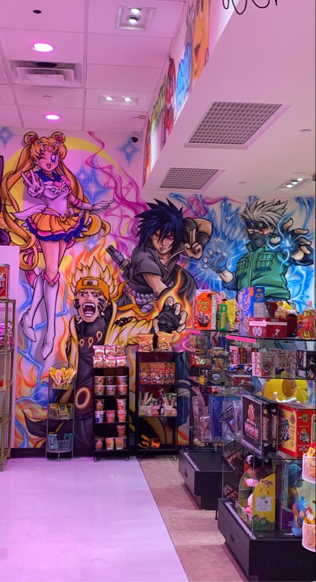 the interior of a toy store with many items on display in front of colorful murals