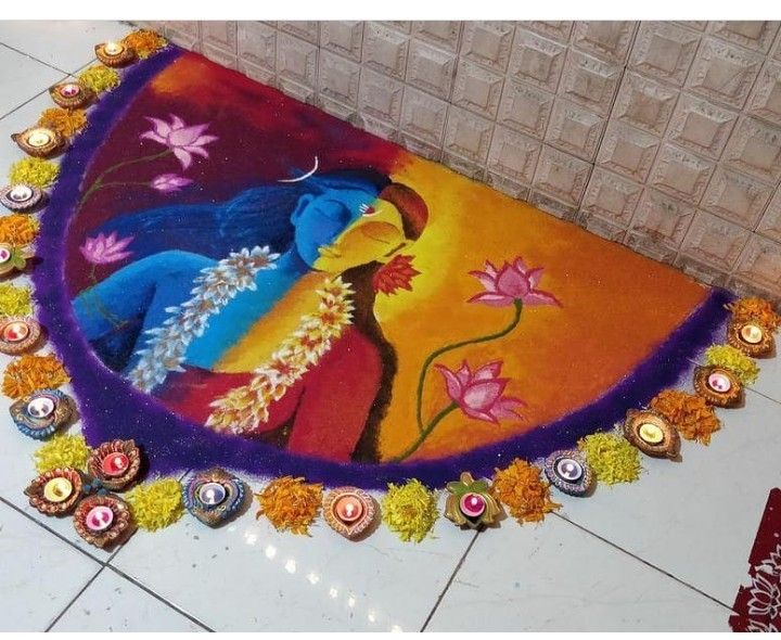 a colorful rug with an image of a woman and flowers on the floor next to candles