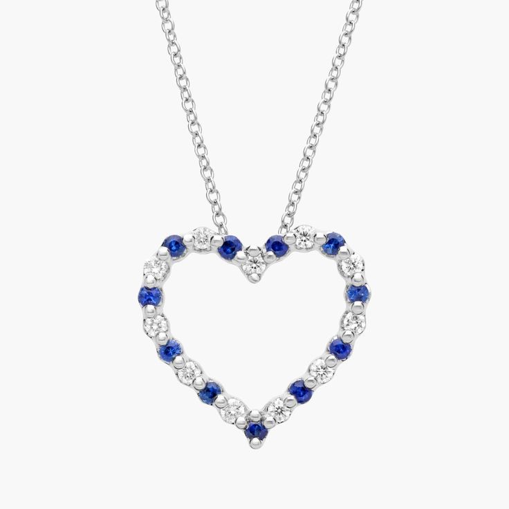 Add a touch of love to your style with this elegant floating pendant featuring a romantic heart shape. The 14k white gold design is set with gorgeously blue sapphires, alternating with brilliantly shimmering diamonds. Sapphire Heart Pendant Jewelry For Anniversary, Fine Jewelry Sapphire Heart Pendant, White Gold Sapphire Heart Pendant Jewelry, White Gold Sapphire Jewelry For Valentine's Day, Anniversary Sapphire Heart Pendant Necklace, Blue Sapphire Jewelry For Valentine's Day, Heart-shaped White Gold Sapphire Jewelry, Sapphire Heart Pendant Necklace For Anniversary, Heart Cut Sapphire Jewelry For Valentine's Day