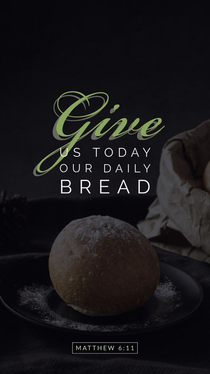 a loaf of bread on a plate with the words give us today our daily bread