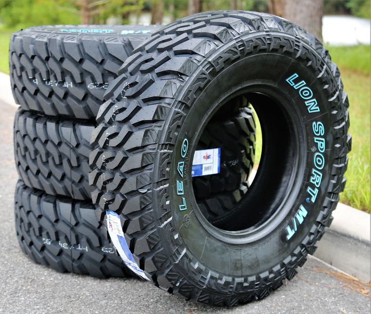 four tires are stacked on top of each other