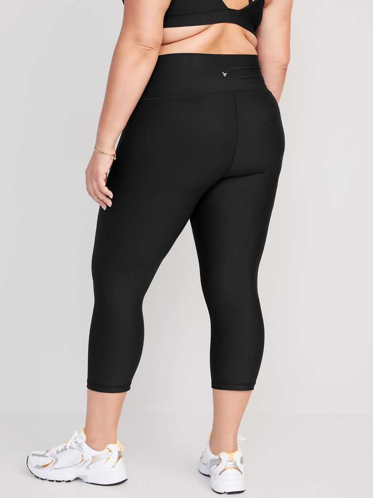 elasticized waist breathable go-dry wicks moisture sits at belly button fitted hits mid-calf 21" inseam models are approx.  5'9" and wear sizes s (4), l (12), and xl (18)machine wash according to the care instruction label Black Gym Bottoms With 5-inch Inseam, Black Yoga Pants With 5-inch Inseam For Gym, Black Running Bottoms With 5-inch Inseam, Black Compression Moisture-wicking Bottoms, Black Moisture-wicking Compression Bottoms, Black High Stretch Yoga Pants With Comfort Waistband, Black Yoga Pants With High Stretch And Comfort Waistband, Black Yoga Pants With Comfort Waistband And High Stretch, Black Athleisure Yoga Pants With Comfort Waistband