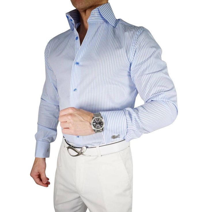 Our signature dress shirt is something that has broken the internet. In a world where features like this are only found in custom shirts, we have decided to create a collection that delivers the same value without having to get measured and pay a hefty price. These shirts will give you that bold look! Never worry again about your collar sliding inside your jacket or not being even. No need for collar stays either! You will be addicted to your new shirts! Quality Details: Sky Blue True to size Si Blue Slim Fit Shirt For Semi-formal Occasions, Luxury Cotton Long Sleeve Dress Shirt, Luxury Long Sleeve Cotton Dress Shirt, Designer Button-up Business Shirt, Luxury Long Sleeve Blue Shirt, Luxury Blue Long Sleeve Shirt, Designer Fitted Button-up Shirt, Designer Blue Shirt For Formal Occasions, Designer Cotton Dress Shirt For Business