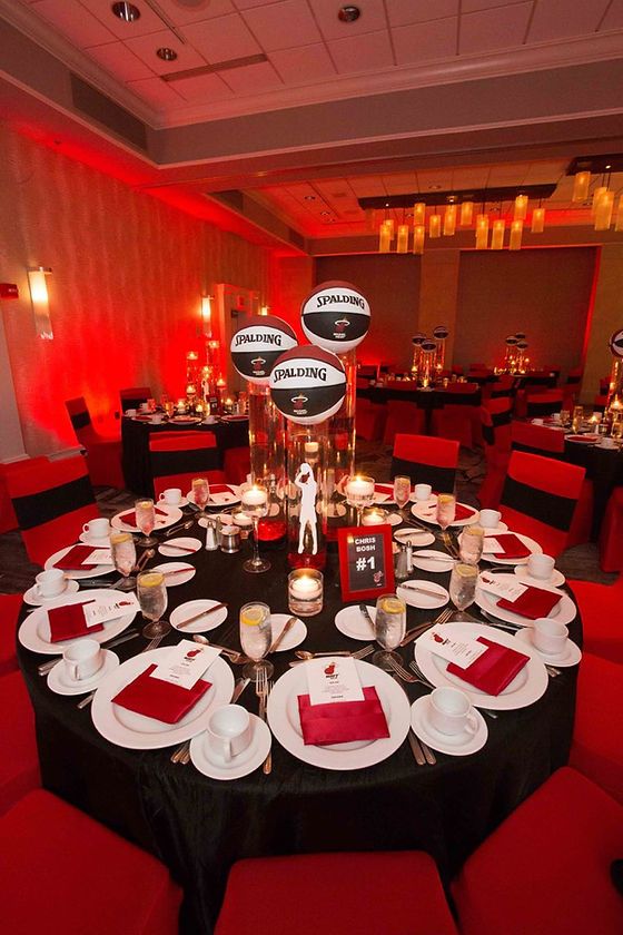 a table set up with plates and place settings