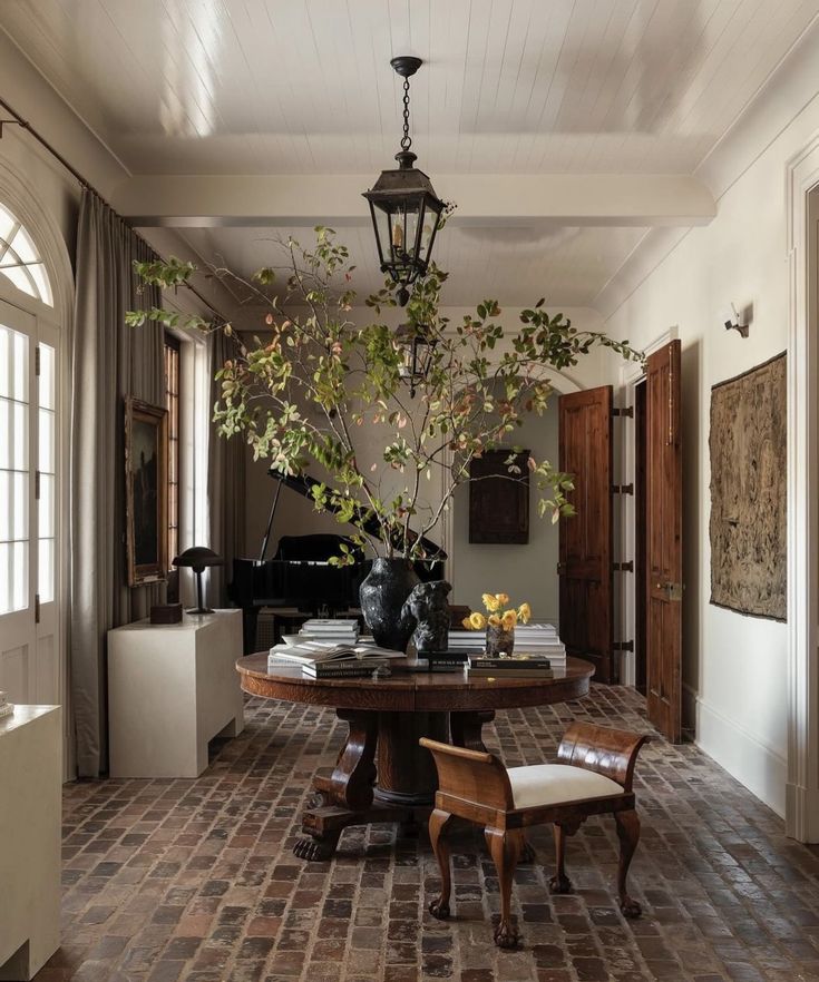 a dining room with a table and chairs