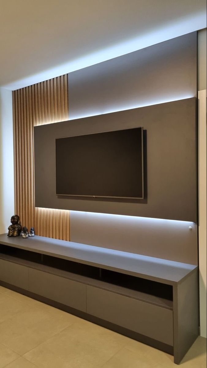 a large flat screen tv mounted to the side of a wall