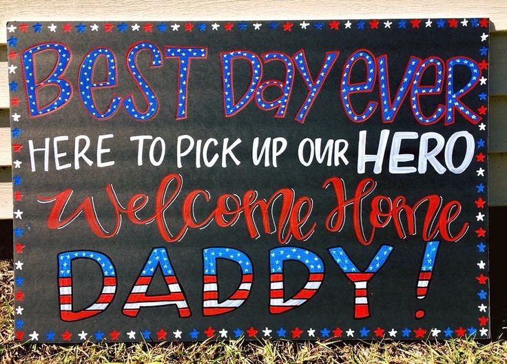 a sign that says best dad ever here to pick up our hero welcome home daddy