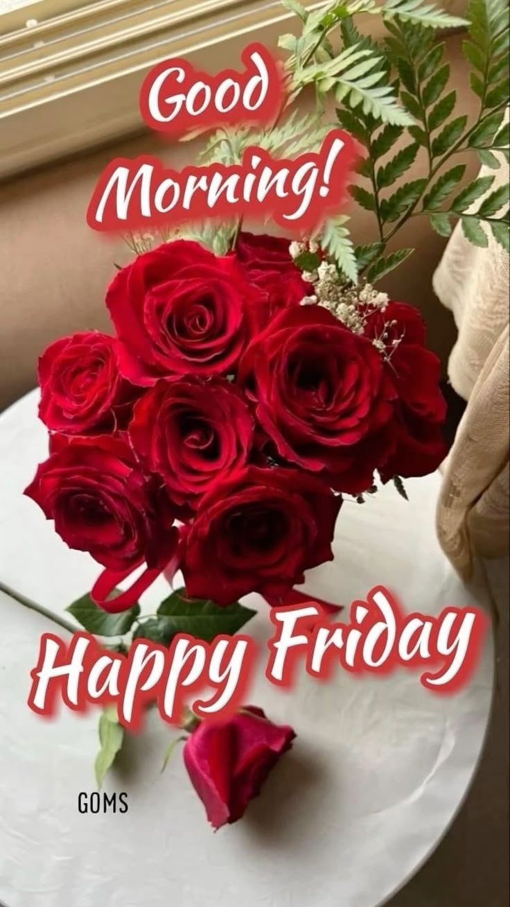 a bouquet of red roses sitting on top of a white plate with the words good morning happy friday