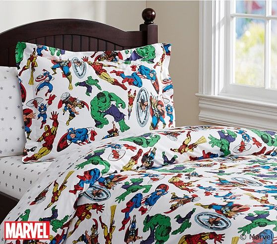 the bedding is made up with superheros on it, and has white sheets