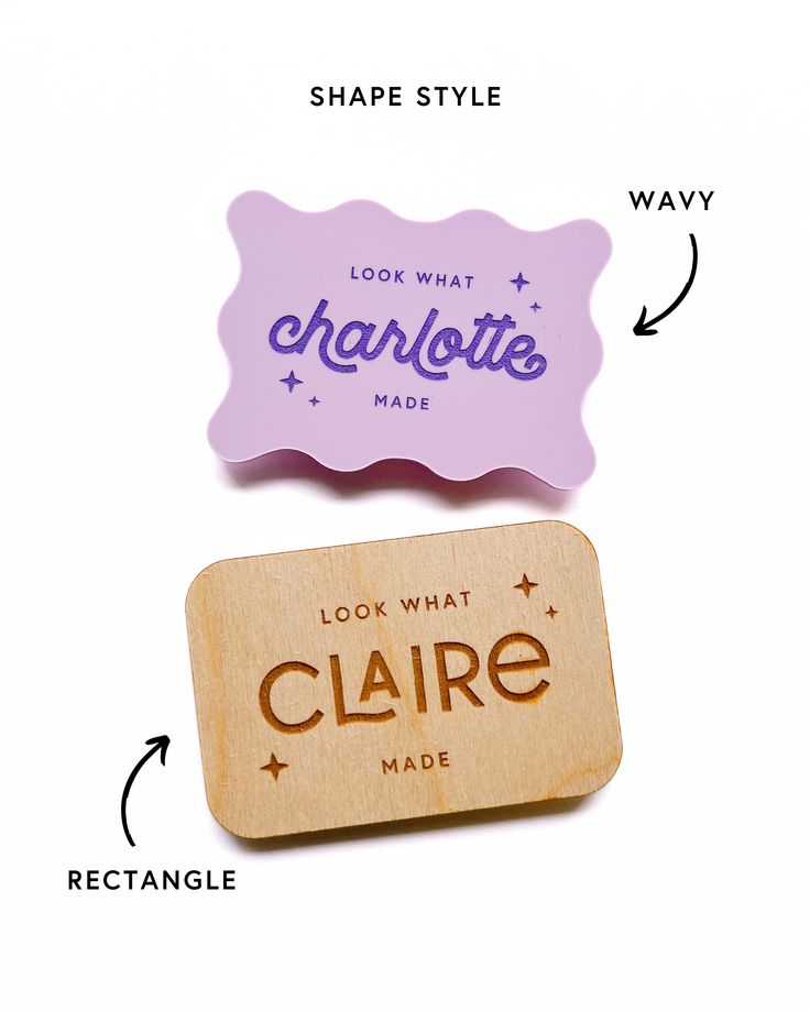 two wooden labels with words on them, one says look what the other says claire made