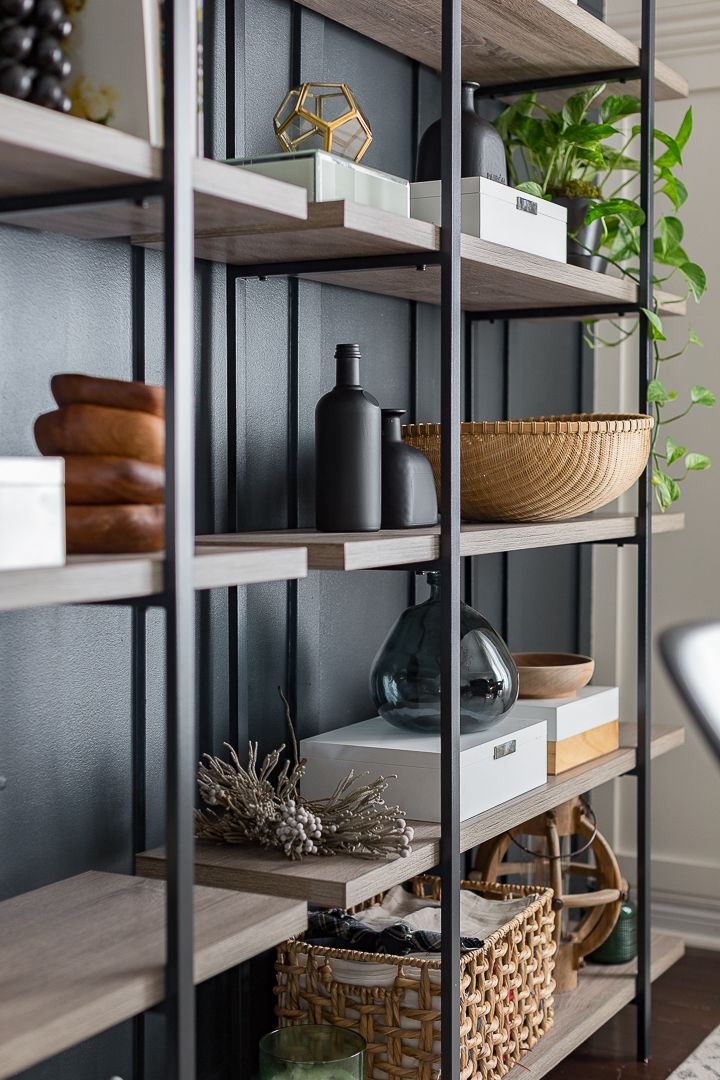 the shelves in this room are filled with plants and other things to put on them