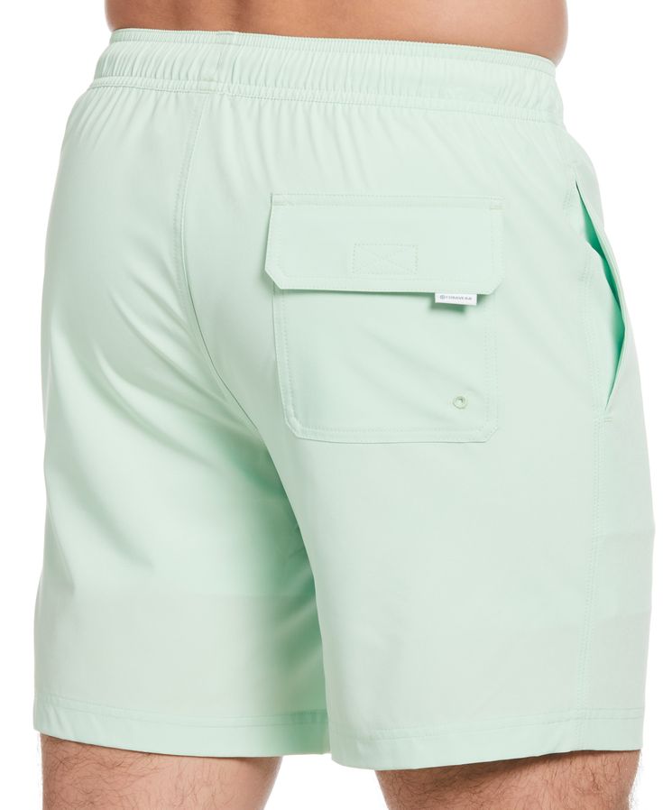 Designed to easily transition from the beach to a relaxing patio lunch, these Cubavera men’s swim shorts feature a versatile solid-colored design. The swimming shorts are made from a flexible stretch fabric that lets you move comfortably. A drawstring elasticized waist keeps them securely in place. Sun protection and moisture-wicking technologies keep you feeling dry while sun protects blocks UV rays while you lounge by the pool or play a game of beach volleyball. The swim trunks are crafted fro Green Swim Trunks With Upf 50+ For Vacation, Green Upf 50+ Summer Swim Trunks, Solid Color Outdoor Swim Trunks, Green Swim Trunks With Elastic Waistband For Pool, Solid Swim Trunks With Built-in Shorts, Casual Green Swim Trunks With Upf 50+, Sporty Green Swim Trunks With Upf 50+, Solid Swim Trunks With Built-in Shorts For Summer, Casual Plain Shorts For Pool