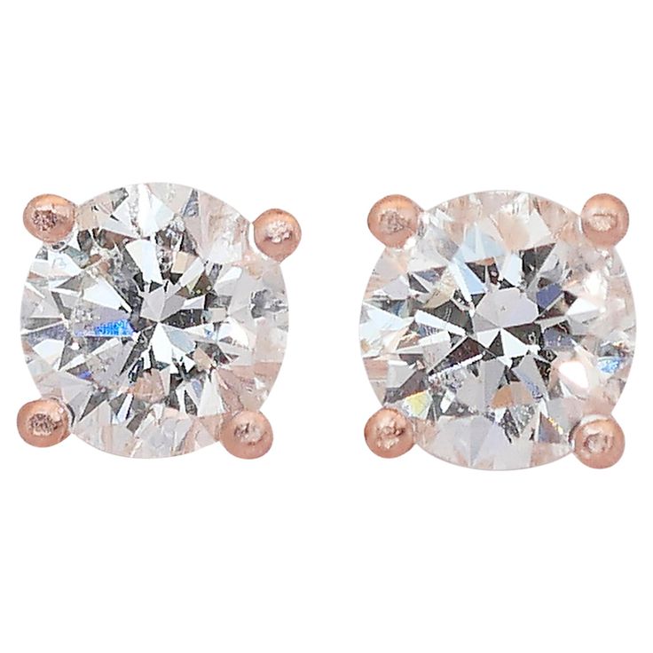 Lovely 1.60ct Diamonds Stud Earrings in 14k Rose Gold - IGI Certified Experience the timeless elegance of these 14k rose gold stud earrings, each featuring a stunning round diamond. With a combined total carat weight of 1.60-carat, ensuring a beautiful sparkle and radiance. Accompanied by an IGI certificate, attesting to the authenticity and excellent quality of these exquisite diamond stud earrings! Metal: 14k Rose Gold Main stone: 2 pcs Diamonds Main stone carat weight: 1.60ct Shape: Round Col Rose Gold Stud Earrings, Rose Gold Earrings Studs, White Gold Studs, White Gold Earrings Studs, Rose Gold Studs, Pave Diamond Ring, Earrings Metal, Gold Stud Earrings, Cushion Cut Diamonds