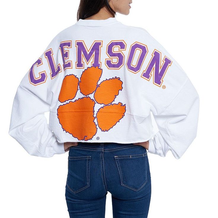 Whether you're a current student, alumni or just a superfan, every member of the Clemson Tigers franchise needs a solid collection of gear. This season, spruce up your look with this chic Raw Hem Cropped Spirit Jersey T-shirt! The fierce Clemson Tigers graphics and super-soft blend make this fun top a must-have addition to your closet!Whether you're a current student, alumni or just a superfan, every member of the Clemson Tigers franchise needs a solid collection of gear. This season, spruce up Cheer Shirts, Jersey Long Sleeve, Spirit Jersey, Clemson Tigers, Tiger T Shirt, Spirit Wear, Nice Tops, Jersey T Shirt, Long Sleeve Hoodie