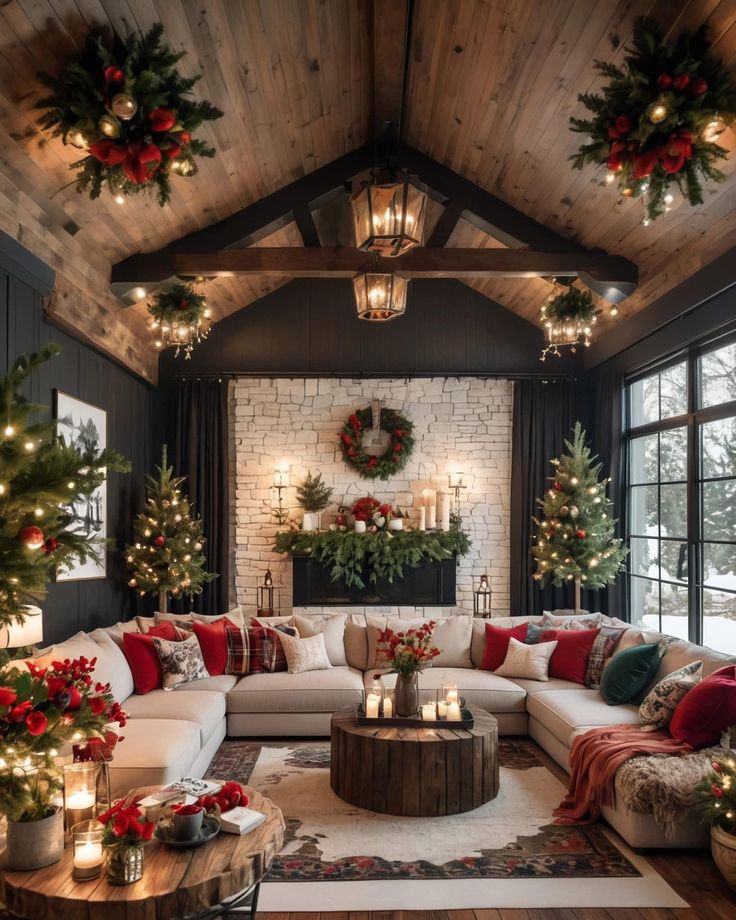 a living room decorated for christmas with lights and wreaths on the ceiling, couches, coffee table and fireplace