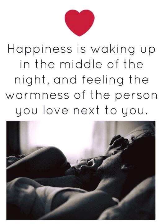 a couple laying in bed with the caption happiness is waking up in the middle of the night, and feeling the warmness of the person you love next to you