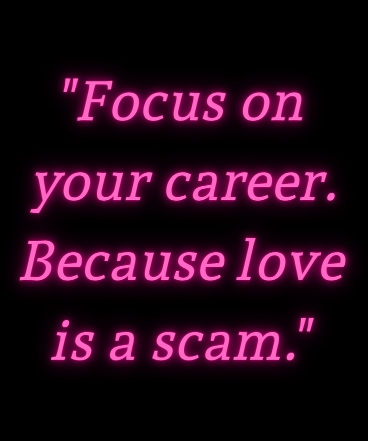 a pink neon sign that says focus on your career because love is a scam