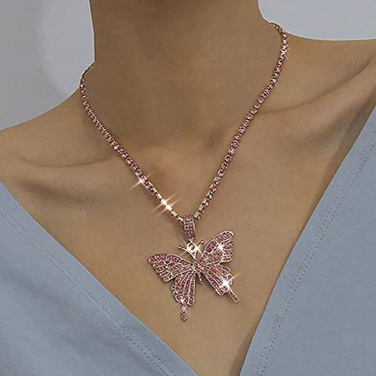 Rhinestone Pendant Necklaces Chain Sparkly Butterfly Short Necklace Is Made Of High Quality Alloy And Rhinestone , It's Strong And Durable ,Doesn't Turn Your Neck Green At All.If You Want To Have A Necklace Suitable For Matching, This Necklace Is Your Ideal Choice Shiny Butterfly Necklace Has 2 Line Extension Chain, You Can Adjust It To Your Own Size So As To Let This Concise Necklace Around Your Neck Perfectly. Package Dimensions : 4 X 3 X 0.1 Inches; 0.35 Ounces Department : Women Asin : B08ld Pink Cubic Zirconia Rhinestone Necklace As Gift, Pink Bling Metal Jewelry, Pink Cubic Zirconia Clavicle Necklace, Pink Metal Jewelry With Bling, Pink Rhinestone Jeweled Necklace For Parties, Pink Metal Clavicle Chain Jewelry, Pink Crystal Rhinestone Necklace, Pink Rhinestone Bling Necklace Gift, Pink Rhinestone Clavicle Chain Necklace