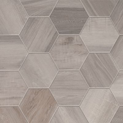 an image of a tile pattern that looks like hexagonals on the floor