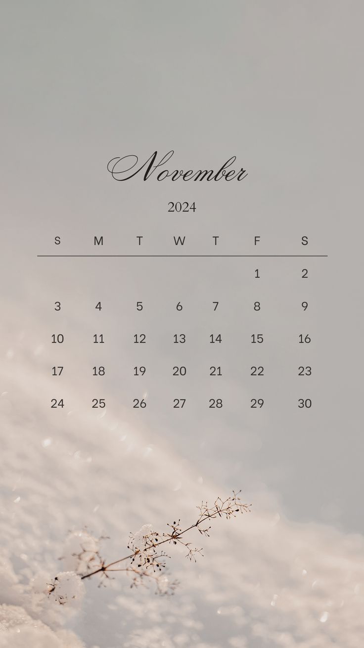 an image of a calendar with the word november on it and flowers in the foreground