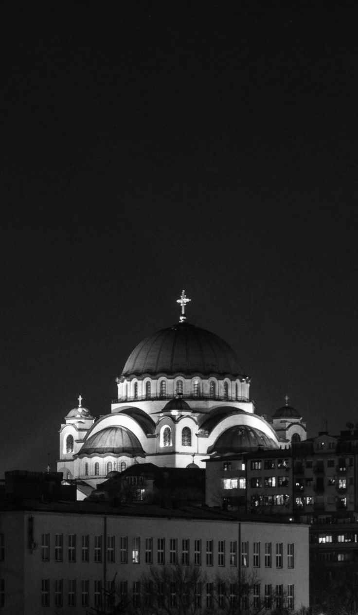 the dome of a building lit up at night