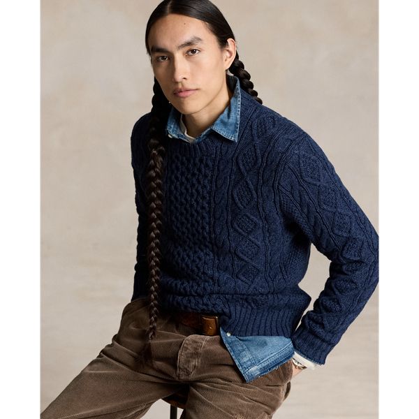 The distinctive patterns that define the classic Aran sweater—a style favored by 19th-century Irish fishermen for its unparalleled warmth and hard-wearing construction—were originally knit to signify the wearer’s family clan. Polo’s all-cotton version symbolizes the wearer’s membership in a different type of group: those who appreciate form function and enduring style. Aran Sweater, A Style, Sweater Outfits, 19th Century, Ralph Lauren, Mens Outfits, How To Wear, Clothes