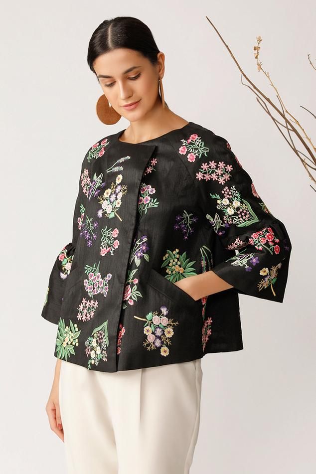 Black overlap jacket with floral embroidered motifs, front pocket and flared sleeves.
Component: 1
Embroidered
Neckline: Round
Sleeve Length: Three quarter
Fabric: Silk
Color: Black
Note: Pant worn by the model is not for sale - Aza Fashions Payal Pratap, Short Kimono, Embroidered Neckline, Jacket For Women, Embroidery Fashion, Embroidered Jacket, Fabric Silk, Embroidered Silk, Black Silk