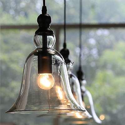 an ebay light hanging from a ceiling in front of a window with the words ebay below it