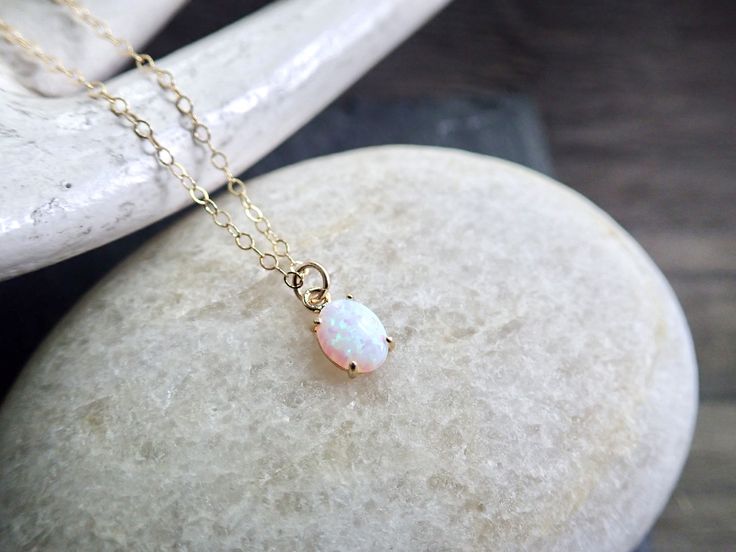 So simple and so sweet. Perfect for layering or for a wearing alone, beautiful genuine opals are set in a 14k gold plated prong setting. Each pendant is made from genuine opals and are set by hand so no two are exactly alike. Soulful, earthy, and oh so cool.*Choose your length: 16" Gold Fill cable chain, or 18" Gold Fill cable chain.*Arrives ready for gifting in a cute boho gift box. *Usually ships same day or next, check shop announcement for occasional delays.*Listing is for one necklace only. Spiritual Moon-shaped Everyday Jewelry, Dainty Brass Moon Charm Necklace, Mystical Moon-shaped Gold Necklace, Celestial Moon-shaped Natural Stone Necklace, Dainty Opal Necklace, Handmade Moon-shaped Amulet Jewelry, Moon Goddess Necklace, Soldering Jewelry, Celestial Jewelry